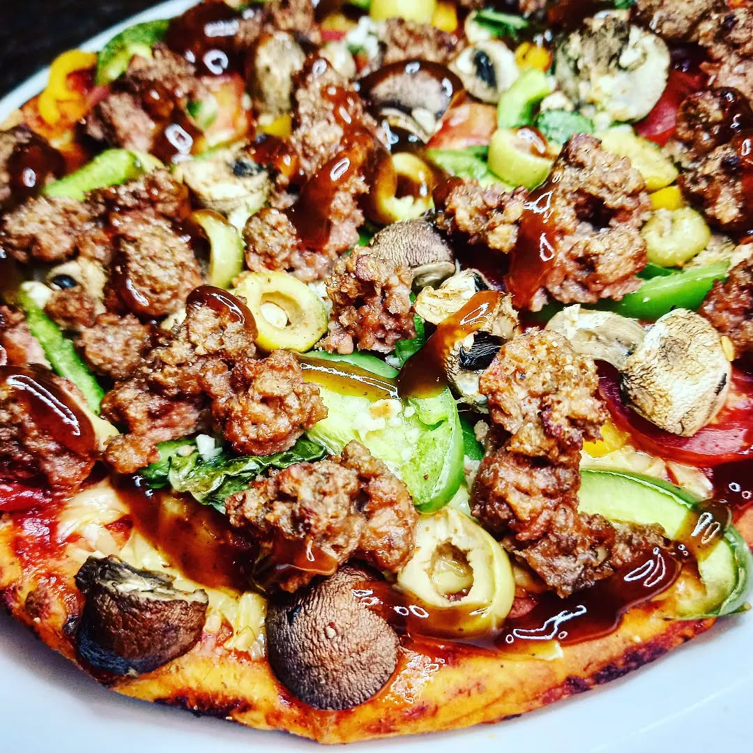 Artisanal vegan pizza with assorted toppings - Plant-based catering Gauteng