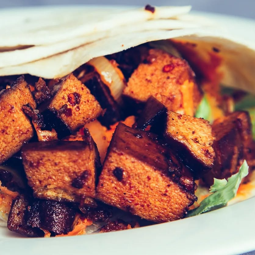 Spicy tofu wrap with fresh vegetables - Exciting vegan food Johannesburg